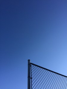A baseball diamond creates interesting patterns against the spring sky.